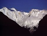 201 End Of Dhaulagiri Ridge From After Marpha I got up in Marpha at 5:30 to a cloudless sky, and after a breakfast Coke, Fanta and Snickers, I was on the trail to Lete at 6:30. I could see the end of the Dhaulagiri Ridge directly ahead in the early morning sun.